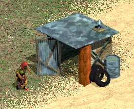 Poor unemployed woman returning to her shack on the beach.